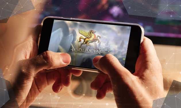 Divine Fortune slot prikazan u pokretu na mobitelu